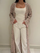Abaya Ayla KIMAIAN - Luxury dark abaya with subtle gold accents, close-up