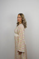 Caftan Rym — side view showing the wide sleeve and side slit