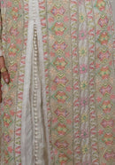 Caftan Rym — detail of the braided trim, covered ball buttons and hand-set crystals