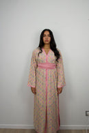 Caftan Yara — full-length hand-embroidered caftan in butter yellow with rose satin belt, front view