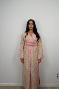 Caftan Yara — full-length hand-embroidered caftan in butter yellow with rose satin belt, front view